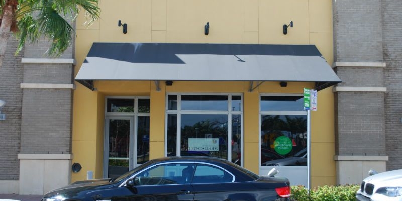 Commercial Awnings – lean-to with single pipe wrap valance – Miami Awning Co (3)
